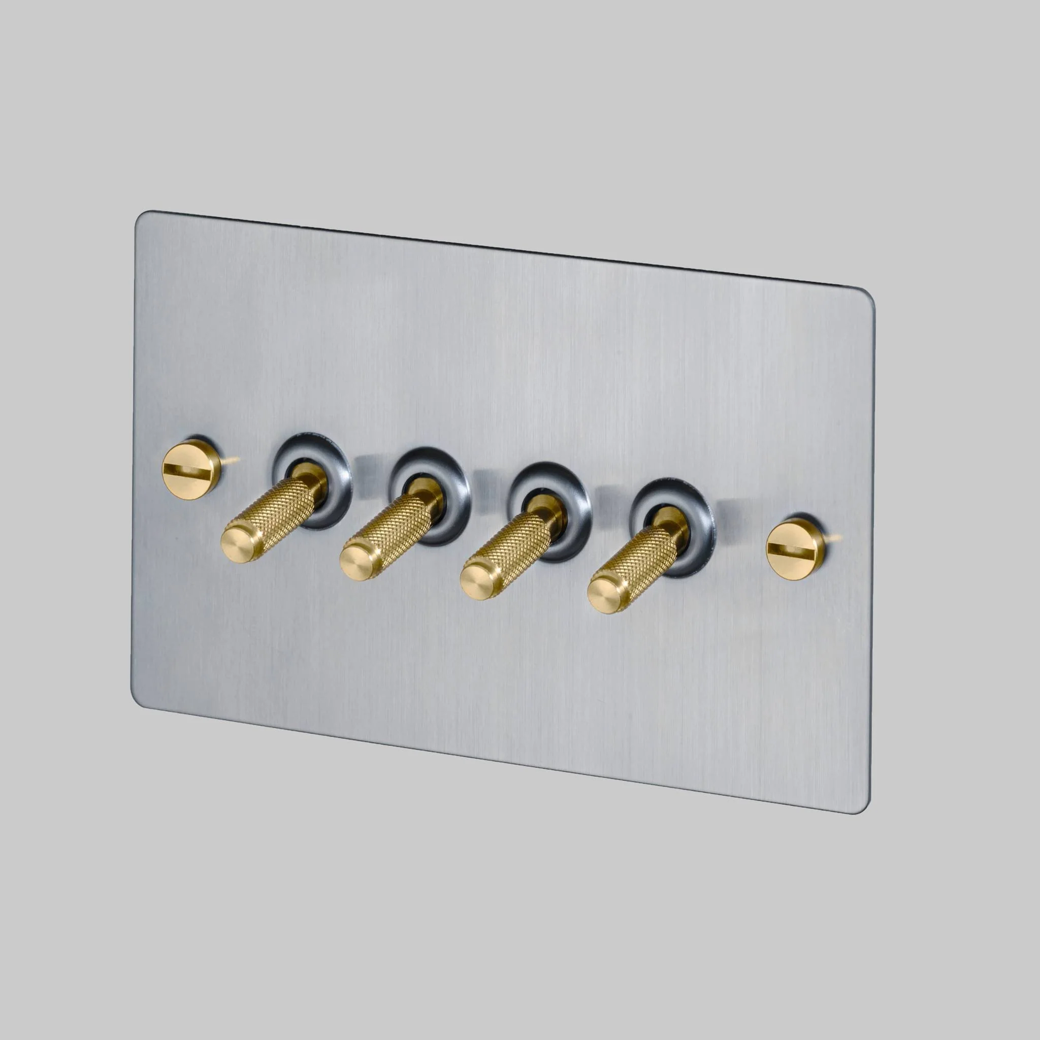 4G TOGGLE Cross Light Switch in Steel