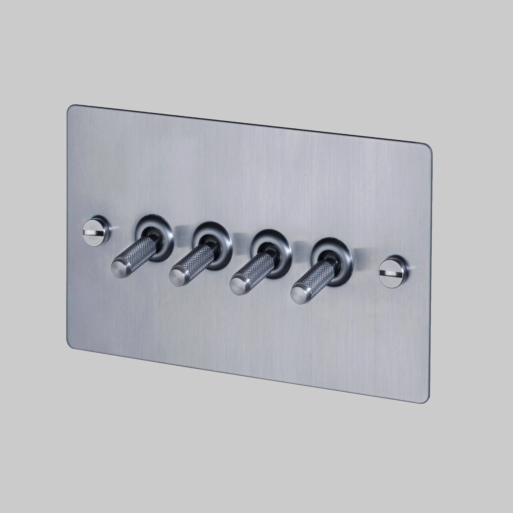 4G TOGGLE Cross Light Switch in Steel