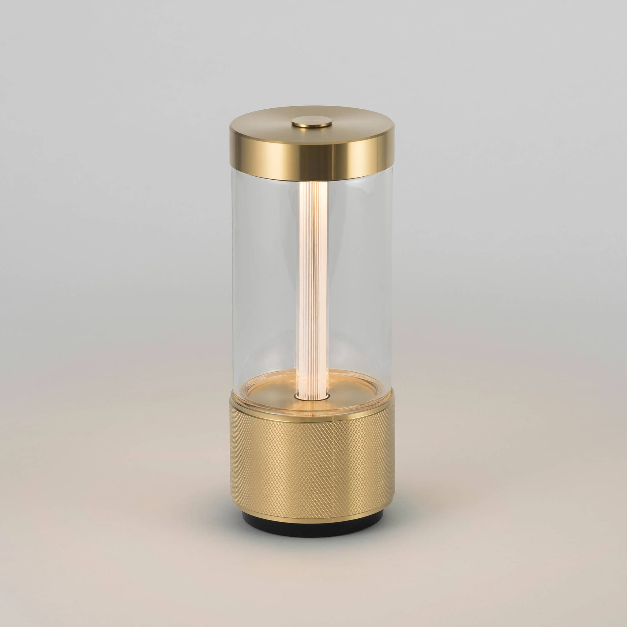 TAKEOUT PORTABLE Portable Table Light in Brass or Steel