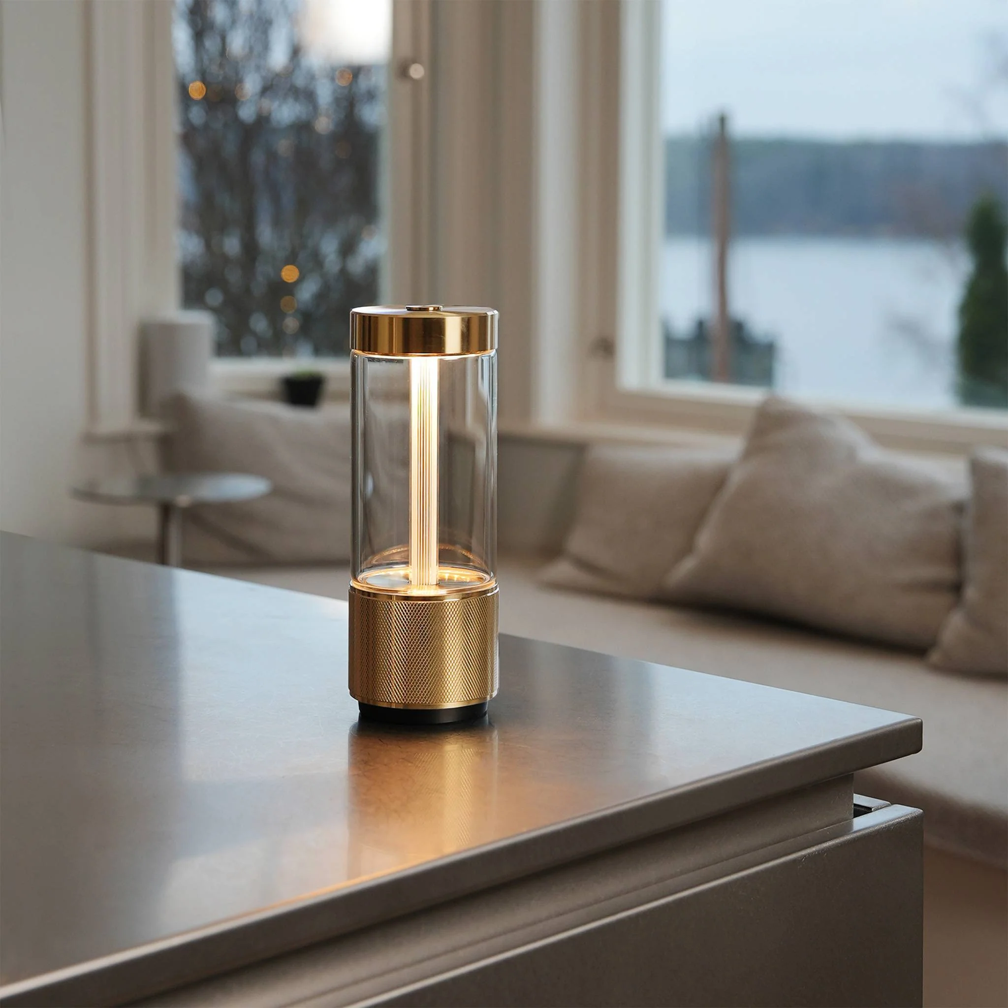 TAKEOUT PORTABLE Portable Table Light in Brass or Steel